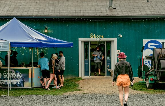 A mobile Pavilion in the Hexagonal shape stands to the left of the Catawba Riverkeeper's front entrance. 