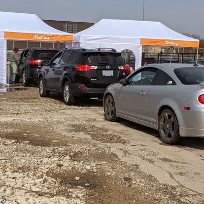 A custom medical tent or drive-thru testing tent with removable signage