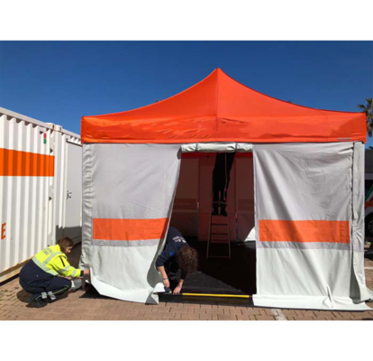 A custom medical tent or field hospital tent with printed signage