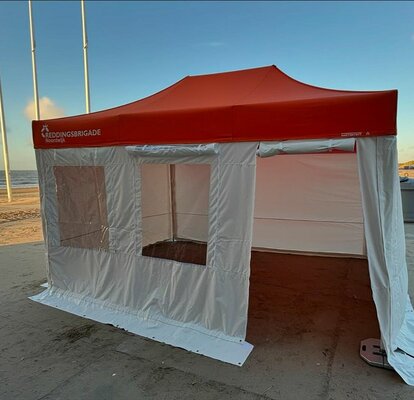A custom medical tent or field hospital tent with printed signage
