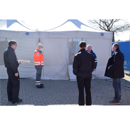 A custom medical tent or field hospital tent with printed signage