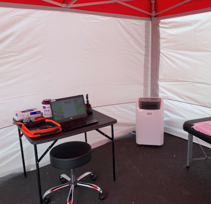 A custom medical tent or field hospital tent with printed signage