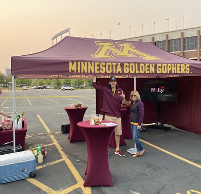 A tailgate tent by Mastertent branded for the Minnesota Golden Gophers.