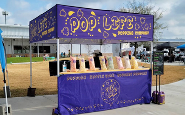 A purple printed popcorn pop-up tent!