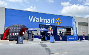 A Mastertent MS5 inflatable set up outside of a Walmart for a Red Bull brand activation. 