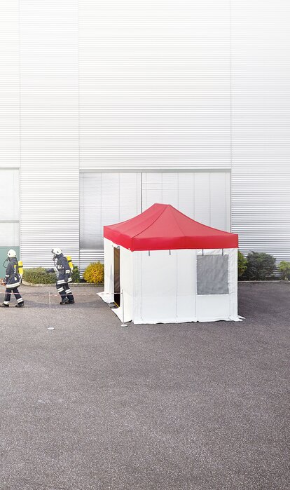 Fire truck and first responders with mobile rescue tent
