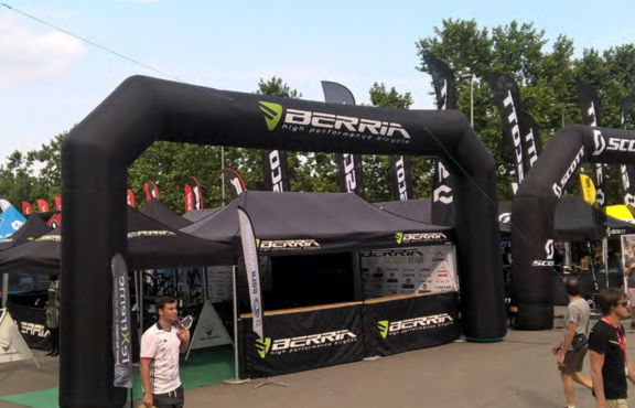 Large arch inflatable over tents at event