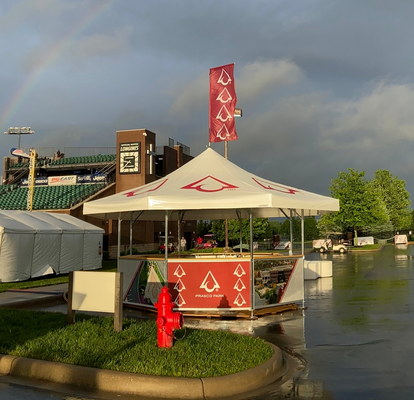 Prasco Park stadium pavilion set up in the rain. 