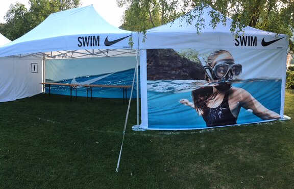White folding gazebos Nike modular system, 6x4m, 4x4m  with customised side walls with Nike Swim logo and sublimation print