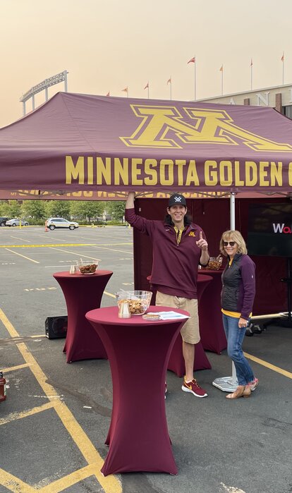 A tailgate tent by Mastertent branded for the Minnesota Golden Gophers.