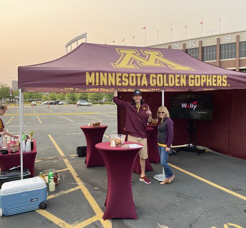 A tailgate tent by Mastertent branded for the Minnesota Golden Gophers.