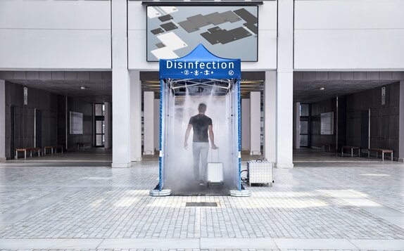 Disinfection tunnel in front of the entrace of a trade show