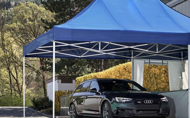 blue 6x4m Mastertent car port tent with storage room and black car