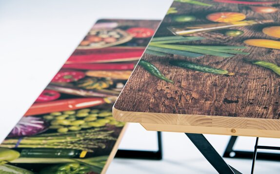 Detailed view of a beer tent set printed with food. 