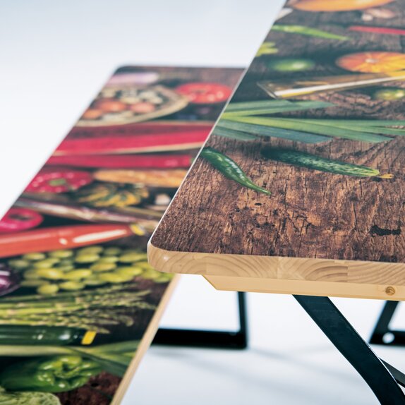 Detailed view of a beer tent set printed with food. 