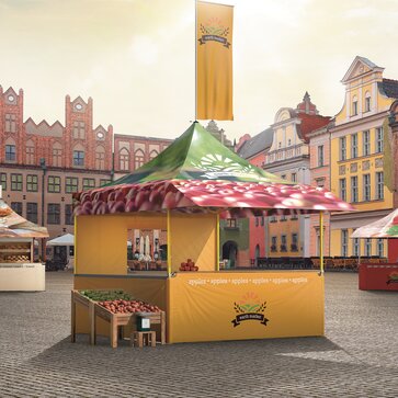Gelbes Marktzelt mit Theke und einer Fahne auf dem Marktplatz. Das Dach ist vollflächig bedruckt.