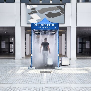 Disinfection tunnel in front of the entrace of a trade show