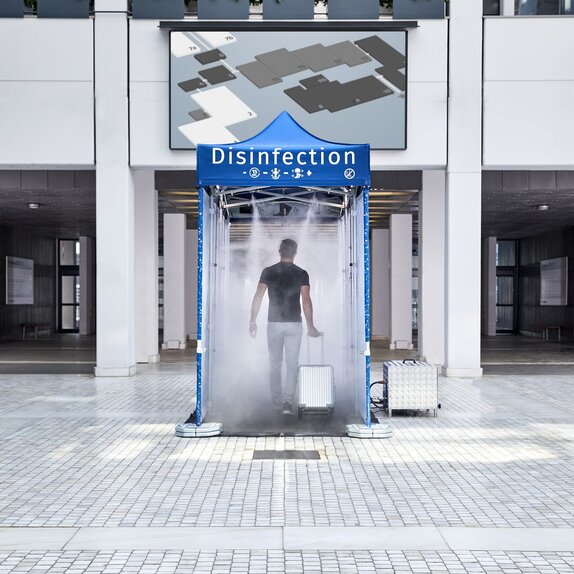 Disinfection tunnel in front of the entrace of a trade show