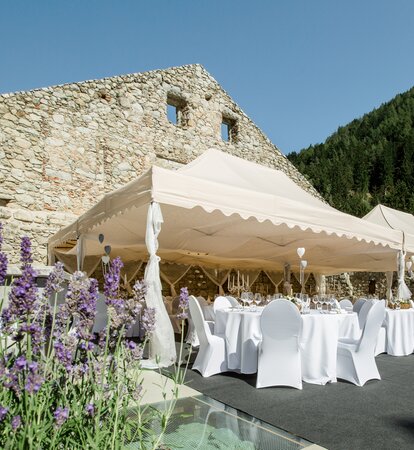 Big elegant folding tents ecru for parties and weddings with scalloped valance