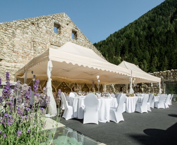 Big elegant folding tents ecru for parties and weddings with scalloped valance