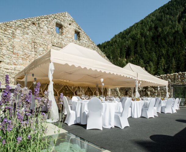 Big elegant folding tents ecru for parties and weddings with scalloped valance