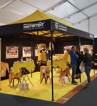 Gazebo 6x3 for trade fair. Yellow and black gazebo customised with HC Pustertal team logo.  