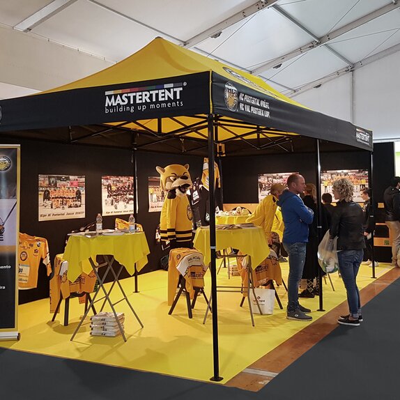 Gazebo 6x3 for trade fair. Yellow and black gazebo customised with HC Pustertal team logo. 