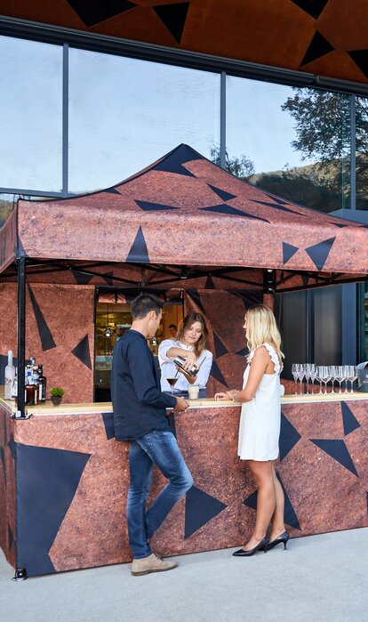 Personalised folding gazebo 3x3m with sublimation photo print, sidewalls and wooden counter for cocktail bars in the gastronomy and catering sector.