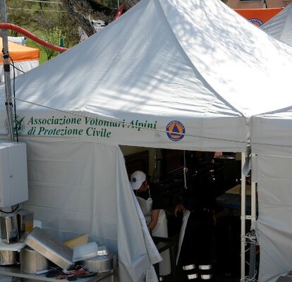 4.5x3 m white gazebo with logo and closed side walls of the Alpini Volunteer Civil Defense Association.