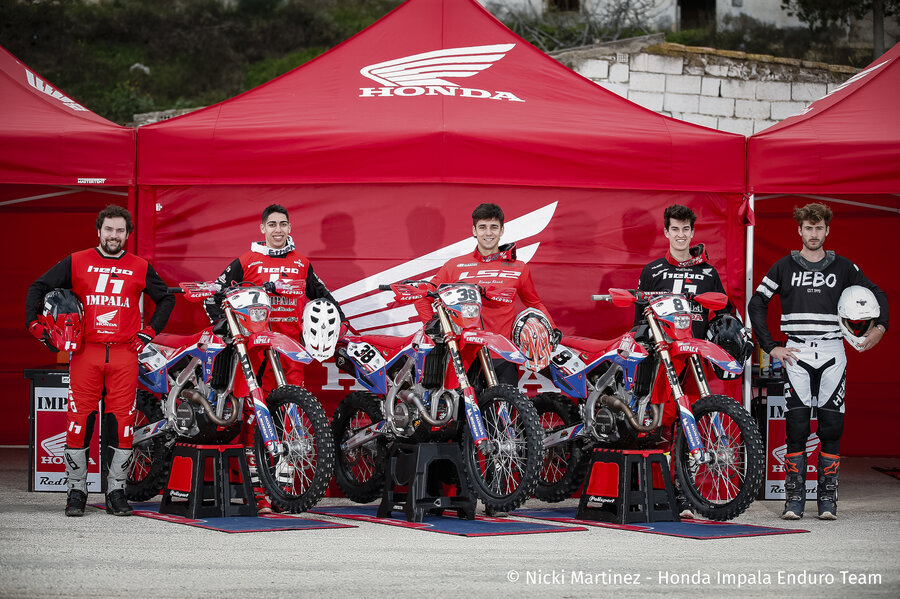 Red gazebo 4x4 m with side walls. Customised with white Honda logo for motocross team promotion