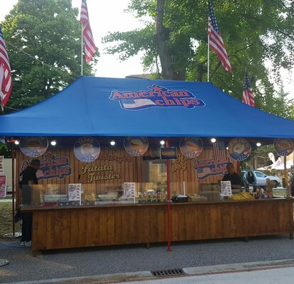 Blue 6x3m "American Chips" streetfood gazebo with red frame and customized with logo and flags