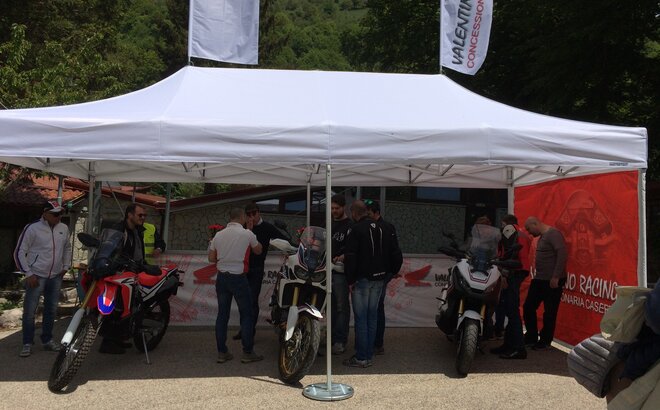 White 6x3m folding gazebo with side wall and custom  flags  Valentino racing - Mastertent