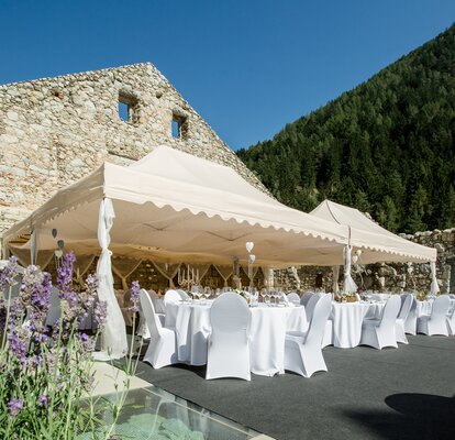 Elegant 6x4 beige folding gazebo with scalloped vallance for wedding reception