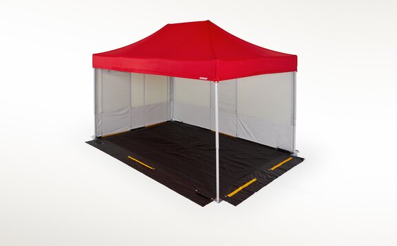 The red gazebo consists of 2 Rescue sidewalls and a black anti-slip floor. 