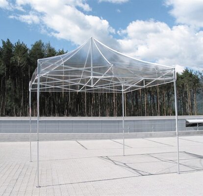 Custom-made gazebo with transparent roof on a paved square. 