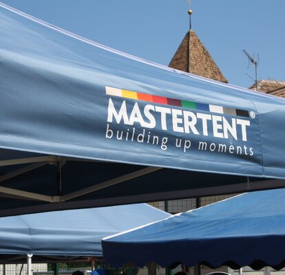 Detail of a blue Mastertent gazebo with logo. 