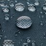 Blue gazebo fabric with large drops of water.