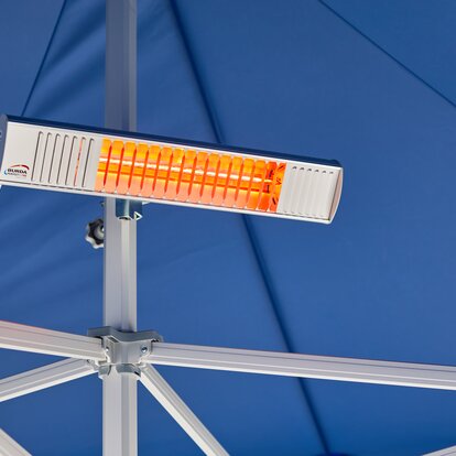 Electric heater for warming a blue Mastertent folding gazebo