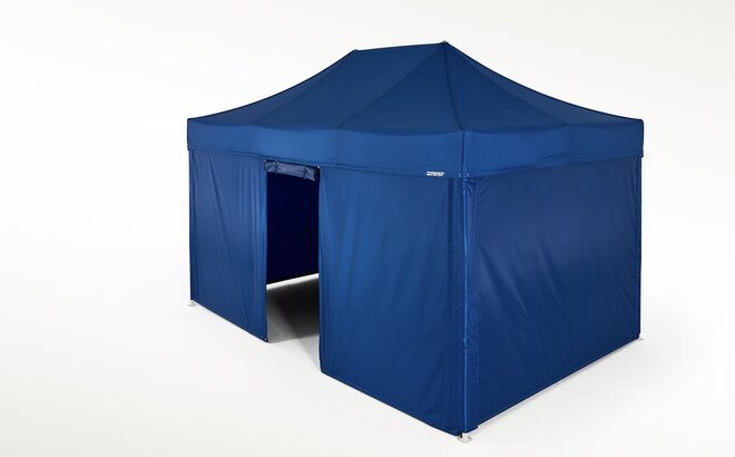 Blue gazebo with closed side walls and one side wall with door. All side walls are blue. 