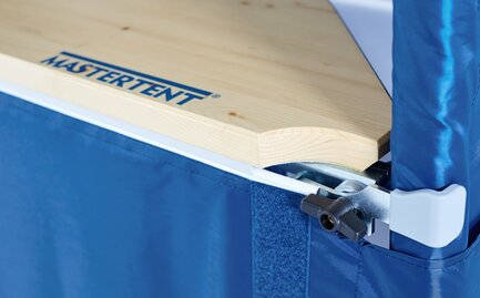 Detailed view of the fastening of a gazebo sidewall and gazebo counter. 