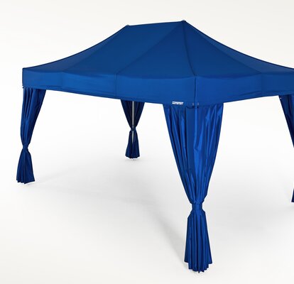 Blue gazebo with corner curtains at each corner. 