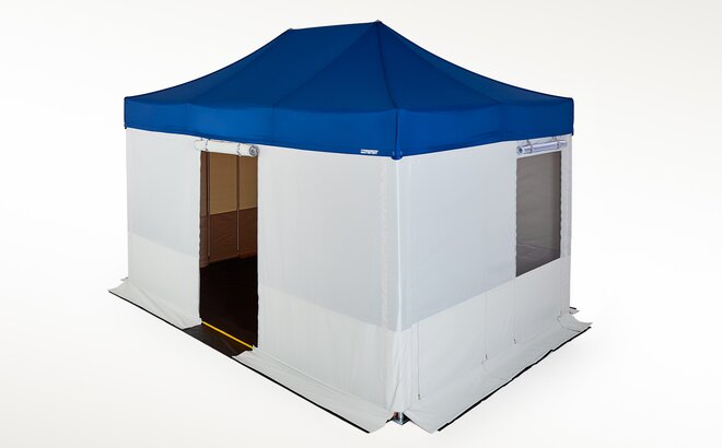 A Mastertent canopy tent with blue roof and grey rescue sidewalls and flooring.